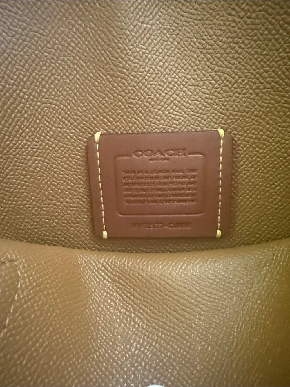 Coach White Pebbled Leather Satchel with Floral Charm